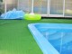 דשא סינטטי בבריכה של קיבוץ